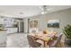 Kitchen dining area with table and chairs, slider to backyard at 3701 Guinevere Ave, Las Vegas, NV 89110