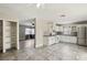 Open kitchen with ample cabinet space and pantry at 3701 Guinevere Ave, Las Vegas, NV 89110