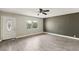 Living room with hardwood floors and an accent wall at 3701 Guinevere Ave, Las Vegas, NV 89110