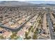 Aerial view of neighborhood with pools and solar panels at 3721 Alcantara Ln, North Las Vegas, NV 89084