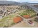 Aerial view of community with baseball fields at 3721 Alcantara Ln, North Las Vegas, NV 89084