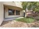 Covered patio with artificial turf and gravel at 3721 Alcantara Ln, North Las Vegas, NV 89084