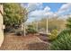 Landscaped backyard with gravel and a metal fence at 3721 Alcantara Ln, North Las Vegas, NV 89084