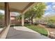 Covered patio with artificial turf and gravel at 3721 Alcantara Ln, North Las Vegas, NV 89084