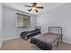 Bedroom with two twin beds and ceiling fan at 3721 Alcantara Ln, North Las Vegas, NV 89084