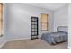 Cozy bedroom with neutral walls and a bookcase at 3721 Alcantara Ln, North Las Vegas, NV 89084