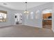 Open dining room features neutral walls and carpeting at 3721 Alcantara Ln, North Las Vegas, NV 89084