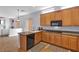 Spacious kitchen with light wood cabinets and granite countertops at 3721 Alcantara Ln, North Las Vegas, NV 89084