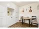 Small dining area with white cabinets and wood floors at 3982 Voxna St, Las Vegas, NV 89119