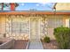 Front view of the house with stone exterior and a security door at 3982 Voxna St, Las Vegas, NV 89119