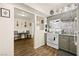 Well-equipped kitchen with gray cabinets, tile backsplash, and modern appliances at 3982 Voxna St, Las Vegas, NV 89119