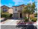 Two-story house with attached garage and landscaping at 4204 Becket Ct, Las Vegas, NV 89129