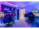 Gaming room with two gaming chairs and LED strip lights at 4204 Becket Ct, Las Vegas, NV 89129