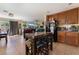 Kitchen with an island, breakfast bar, and views into the living room at 4204 Becket Ct, Las Vegas, NV 89129