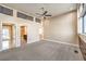 Bedroom with en-suite bathroom and carpet flooring at 505 Ville Dr, Boulder City, NV 89005