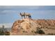 Two desert bighorn sheep on rocky hillside at 505 Ville Dr, Boulder City, NV 89005