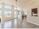 Bright dining room with hardwood floors and access to a deck at 505 Ville Dr, Boulder City, NV 89005