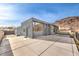 Contemporary home with spacious backyard patio at 505 Ville Dr, Boulder City, NV 89005