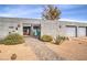 Single story home with three car garage and walkway at 505 Ville Dr, Boulder City, NV 89005