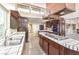 Spacious kitchen featuring double sinks, an island, and ample cabinetry at 505 Ville Dr, Boulder City, NV 89005