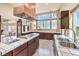 Kitchen with stainless steel appliances and a copper range hood at 505 Ville Dr, Boulder City, NV 89005