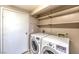 Laundry area with washer, dryer, and storage at 505 Ville Dr, Boulder City, NV 89005