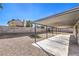 Backyard with covered patio and putting green at 5117 Dancer Way, Las Vegas, NV 89107