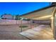 Covered patio, gravel yard, putting green at 5117 Dancer Way, Las Vegas, NV 89107