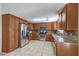 Spacious kitchen, granite countertops, and stainless steel appliances at 5117 Dancer Way, Las Vegas, NV 89107