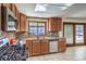 Kitchen features granite counters, stainless steel appliances, and backyard access at 5117 Dancer Way, Las Vegas, NV 89107