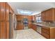 Kitchen with granite countertops and stainless steel appliances at 5117 Dancer Way, Las Vegas, NV 89107