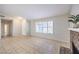 Living room featuring tile floors and a brick fireplace at 5117 Dancer Way, Las Vegas, NV 89107