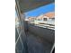 Private balcony overlooking community; features tile flooring and wrought iron railing at 5201 S Torrey Pines Dr # 1244, Las Vegas, NV 89118