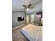 Main bedroom with wood-look floors and access to other rooms at 5201 S Torrey Pines Dr # 1244, Las Vegas, NV 89118