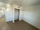 Bright bedroom with closet and wood-look floors at 5933 Vegas Dr, Las Vegas, NV 89108