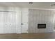 Living room with fireplace and light wood flooring at 5933 Vegas Dr, Las Vegas, NV 89108