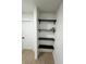 Built-in shelving unit with black shelves at 5933 Vegas Dr, Las Vegas, NV 89108