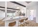 Updated kitchen featuring black accents, white cabinets, stainless appliances and an eat-in countertop at 701 N Yale St, Las Vegas, NV 89107