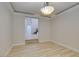 Formal dining room with view of the entry and staircase at 7024 Bluebird Wing St, North Las Vegas, NV 89084