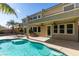 Inviting pool with expansive patio and covered seating at 7024 Bluebird Wing St, North Las Vegas, NV 89084