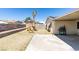 Backyard with patio, playset, and grill at 7037 Pleasant View Ave, Las Vegas, NV 89147