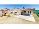 Backyard with patio, playset, and grill at 7037 Pleasant View Ave, Las Vegas, NV 89147