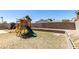 Backyard with playset and storage shed at 7037 Pleasant View Ave, Las Vegas, NV 89147