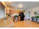 Kitchen with stainless steel appliances and wood cabinets at 7037 Pleasant View Ave, Las Vegas, NV 89147