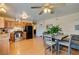 Well-equipped kitchen with wood cabinets and black appliances at 7037 Pleasant View Ave, Las Vegas, NV 89147