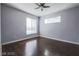 Bright bedroom with hardwood floors and large window at 7167 S Durango Dr # 203, Las Vegas, NV 89113