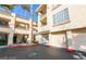 Exterior view of building showcasing attached garages at 7167 S Durango Dr # 203, Las Vegas, NV 89113