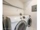 Bright laundry room with washer and dryer included at 7167 S Durango Dr # 203, Las Vegas, NV 89113