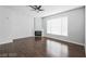 Living room with hardwood floors and corner fireplace at 7167 S Durango Dr # 203, Las Vegas, NV 89113