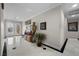 Foyer featuring marble floors, decorative art and a beautiful leaded glass entry door at 7450 Via Olivero Ave, Las Vegas, NV 89117